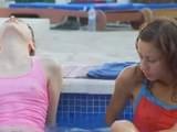 Ultra petite lesbian girlfriends kissing whole body and making love in the outdoor pool