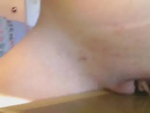 Watch this very cute babe do a pretty good pussy and clit rub on the table till she orgasm right on top of it