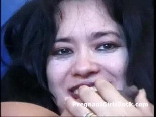 Voluptous ethnic pregnant mami with big tits Devin DeMoore plays with her shaved pussy. Devin cant control herself when she sees a stud walk in with a rock hard dick. Without thinking it twice she get
