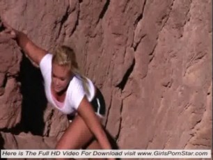 A super sexy blonde undress in a mountain area and rub their fingers pussy