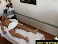 Asian masseuse massages a guys cock as an extra service