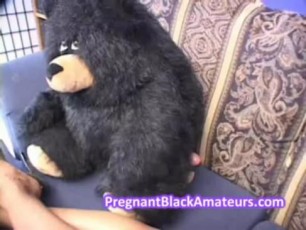 Naughty slutty big breasts pregnant babe fucks herself with a big white dildo. She sticks the toy deep inside into her shaved wet cunt to get more pleasure.