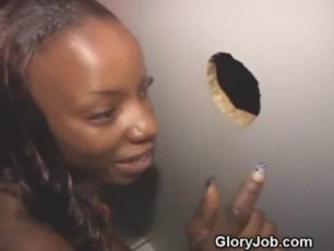 Black amateur beauty at a glory hole sucking white cock like its her favorite lollipop.
