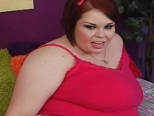 Short haired fat redhead momma plays with her new dildo