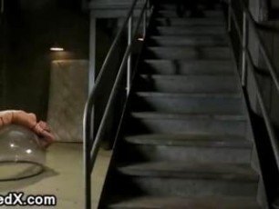 Strapped to a hemisphere huge round boobs brunette babe gets hard flogged and made to lick pussy to busty babe in stockings