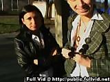 Two European girls flash titties and pussy outdoors in public.