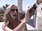 Busty blonde horny babe sucking a huge fat cock outside