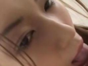 Asian slut loves to buff the helmet in order to please her man