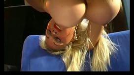 Big tit German blonde toying her pussy with a big red rubber dildo