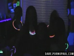 College teenagers dorm room party gets wild with glowsticks
