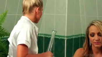 Lesbo mistress in white gets wet in bathtub