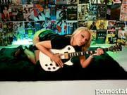 This babe sure likes her guitar. One thing she likes morte than guitars, is sucking a big dick, and she sure as hell proves it in this video!