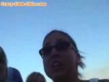 Sexy lesbians get wild in their string bikinis on stage in public when one licks the others clit and then they show off in the wet tshirt contest.