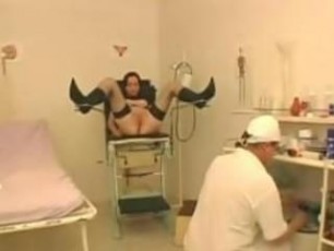 Brunette gets a stetoscope inserted in her vagina for gyno checking