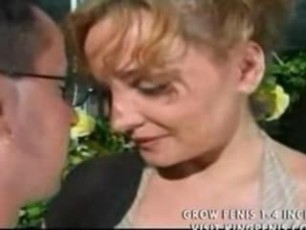 I surprised my wife on front of our house, on the sidewalk, letting a young teenager kiss it and fiddle his tits in public, then removing his dress, take her by rear and fuck her totally naked in street, front every passers who recognized it.