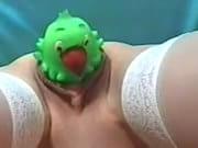 Check out this horny slut shove a huge kids toy in her pussy and shoot it out. She uses this trick to stop her kid from crying