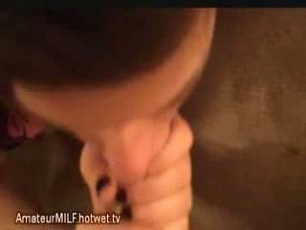 See this sweet brunette MILF with big tits suck cock and balls, then swallow cum.
